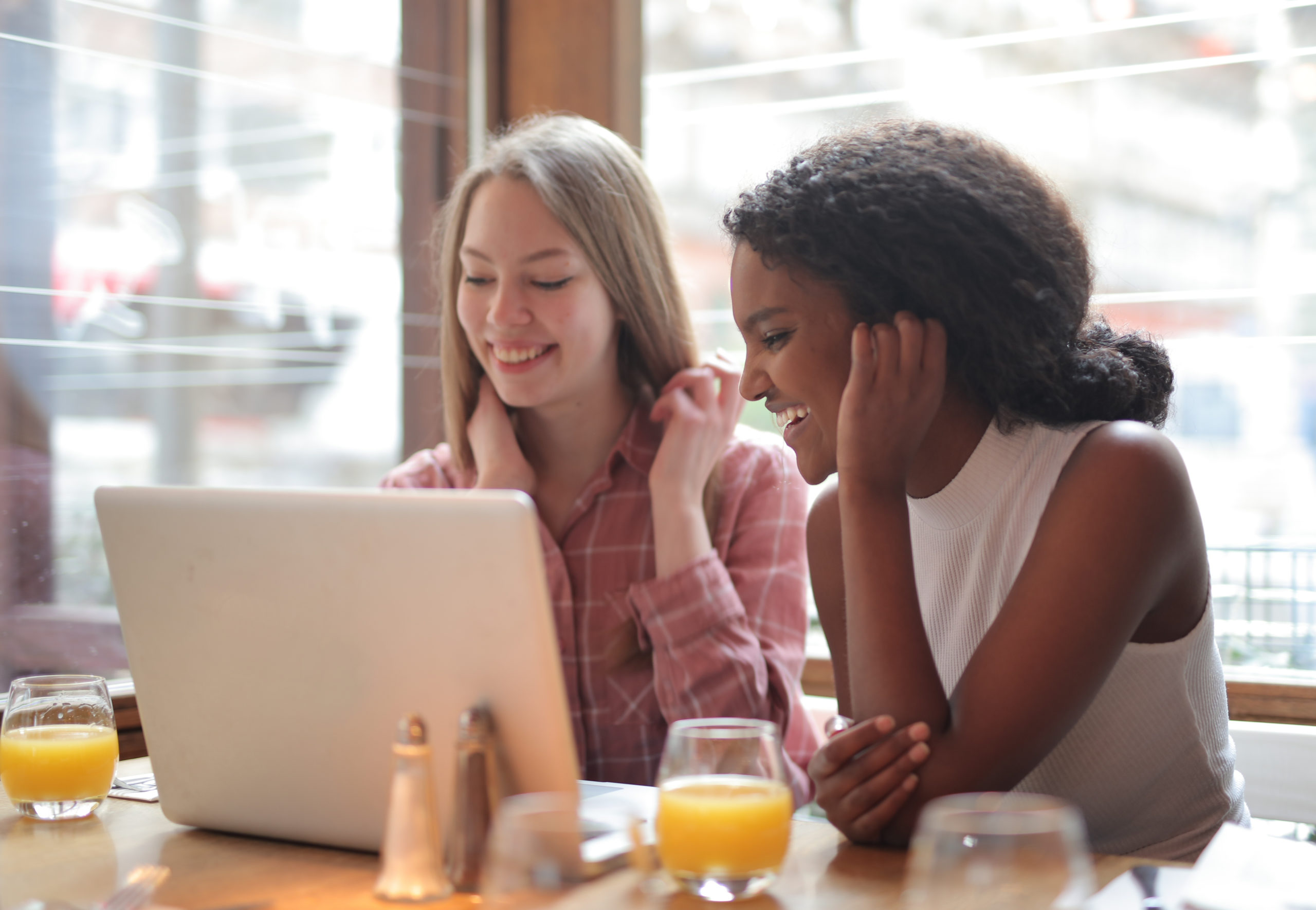 Canva-Two-Women-Smiling